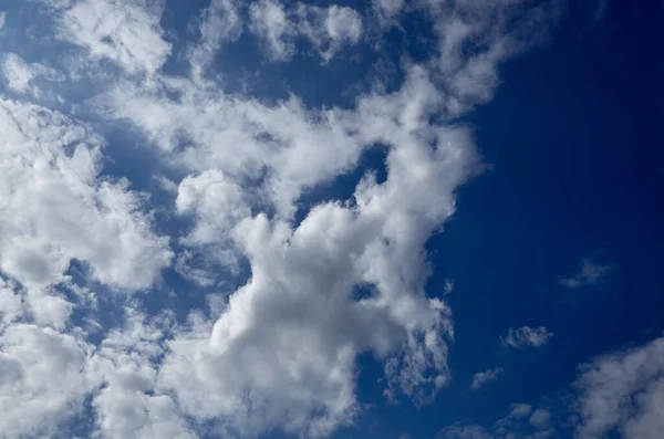 Abstract image of blurred sky. Blue sky background with cumulus clouds