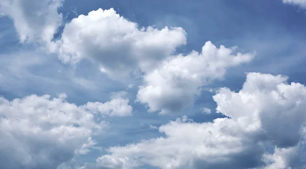 Abstract image of blurred sky. Blue sky background with cumulus clouds