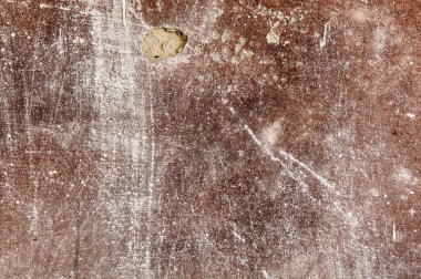 Çatlakları ve çizikleri olan beton bir duvarın dokusu arka plan olarak kullanılabilir. Eski beton duvar, kırık duvar.