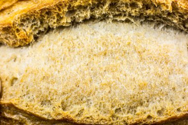 Kızarmış ekmek dokusu arka planı. Loaf Pastanesi kavramı. Yaklaş, makro fotoğraf. Güzel doğal duvar kağıdı.