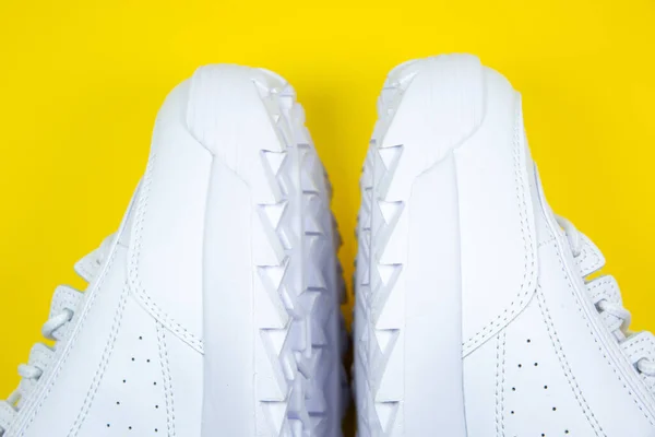Modern Sneakers Yellow Background White Leather Trainers Big Sole Spikes — Stock Fotó