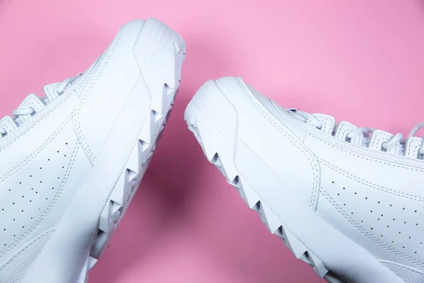Modern Sneakers Pink Background White Leather Trainers Big Sole Spikes — Zdjęcie stockowe