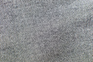 Retro Gray hippi kot pantolon kumaşı. Denim Kumaş dokusu arka planı. Doğal kumaşlar tekstil.