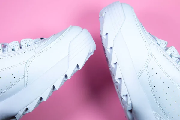 Modern Sneakers Pink Background White Leather Trainers Big Sole Spikes — Zdjęcie stockowe