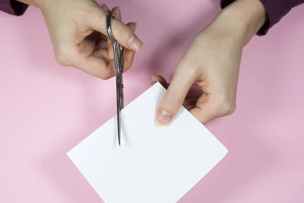 Woman Cutting White Paper Scissors Close — ストック写真