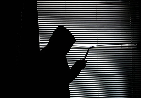 Criminal Crowbar Spying Window Old Shutter Blinds Robber Dark Hoodie — Foto de Stock
