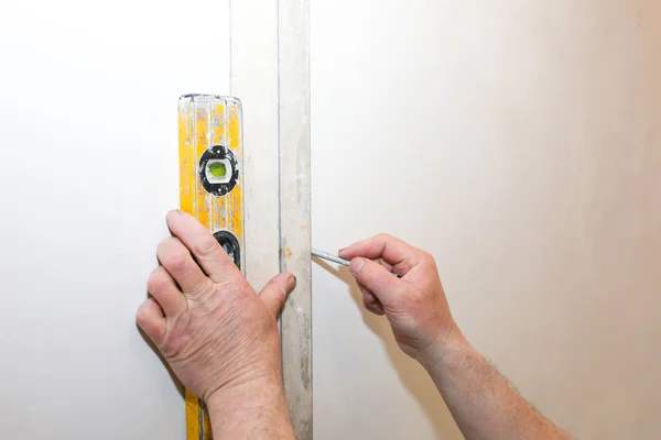 Man Holding Spirit Level Hands Hanging Wallpapers Maintenance Repair Works —  Fotos de Stock