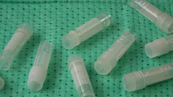 Transparent Little Test Tubes Lying Table Sterile Medicine Equipment — стоковое видео