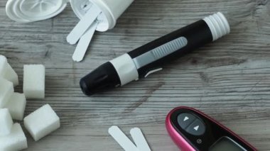 Diabetes testing. Sugar cubes on the table.