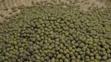 Pile of raw green mung beans or Vigna radiata seeds