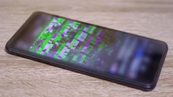 Signal Distortion, Interference, Glitches on Screen of a Smart Phone. Close up — Stock Video