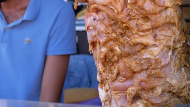 Raw Marinated Chicken Fillet with Onions on a Skewer for Frying Shawarma — Stok Video