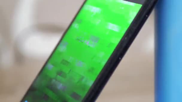 Signal Distortion, Interference, Glitches on Screen of a Smartphone. Close up — Stockvideo