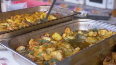 Sale Ready Fried Potatoes in Food Containers on Open Market Counters. 4K