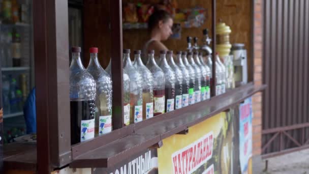 Sale of Spirits, Alcohol, Wines in an Open Showcase of a Local Street Market. 4K — стоковое видео