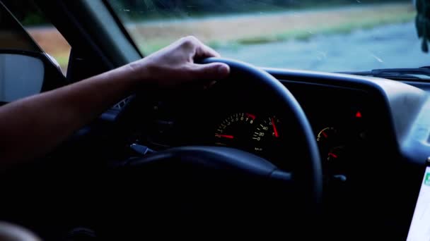 Male Hands Hold Steering Wheel While Driving of Car. Slow motion — Stock videók