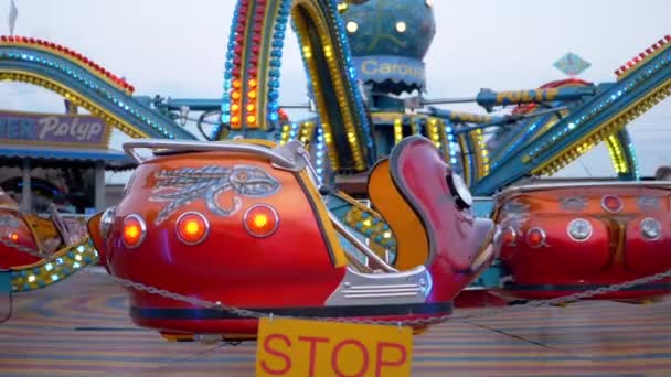 Slow Spinning Carousel of Octopus in an Amusement Park. 4K. Close up — Video