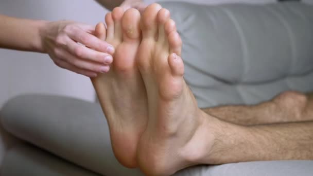 Female Hands Massage Bare Male Feet, Toes, Soles. Close up. Zoom — Stock Video