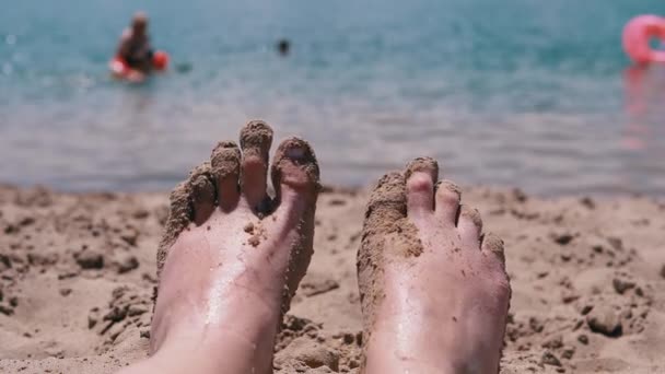Pov Female Wet Feet Sand Lying Sandy Beach Sun Glare — Stock Video