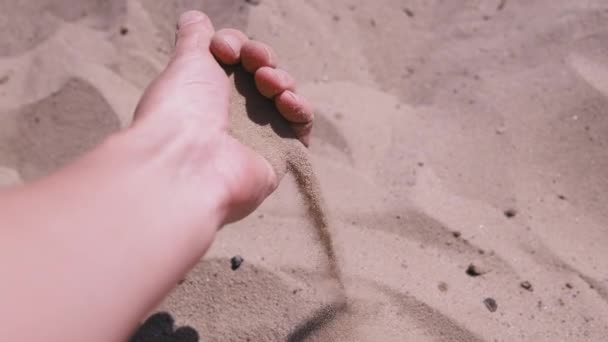 Female Hand Pours Sand Fingers Beach Rays Sunlight Fine Grains — Stok video