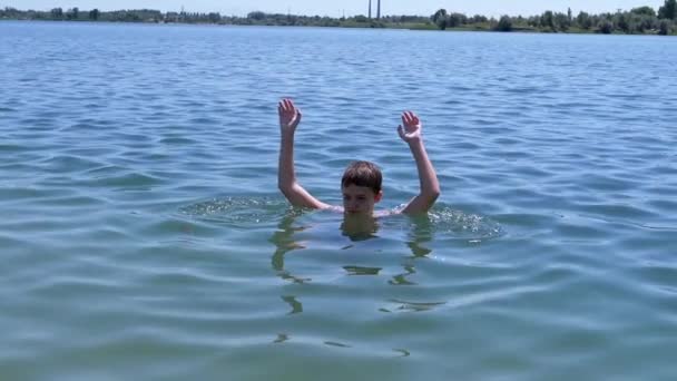 Smiling Child Swimming Splashing Beach Sun Sea Boy Playing Water — Vídeo de Stock