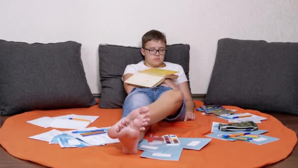 Sleeping Child Lying Floor Cover Pillows Book Stomach Tired Schoolboy — Stock Video