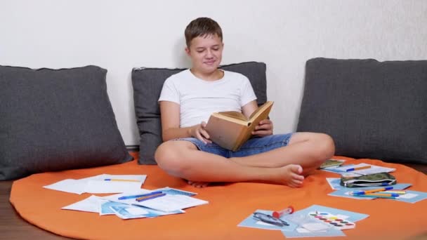 Laughing Teen Reading Interesting Book Sitting Floor Room Time Lapse — Stockvideo
