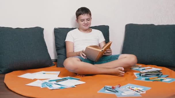 Laughing Teen Reading Interesting Book Sitting Floor Room Time Lapse — Stock video