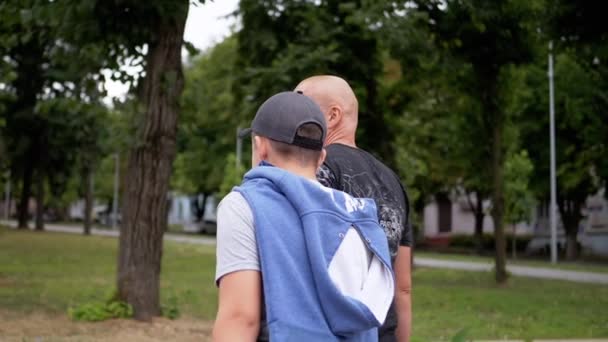 Back View Happy Father Son Walking Park Outdoors Cloudy Weather — Vídeos de Stock