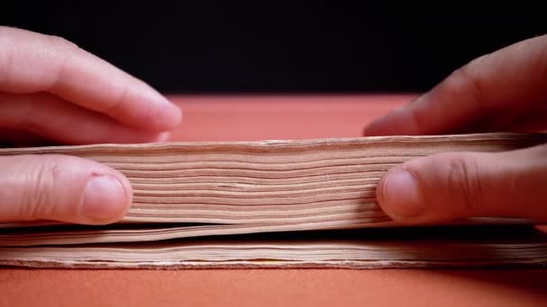 Female Fingers Leafing Pages Old Shabby Book Black Background Reading — kuvapankkivideo