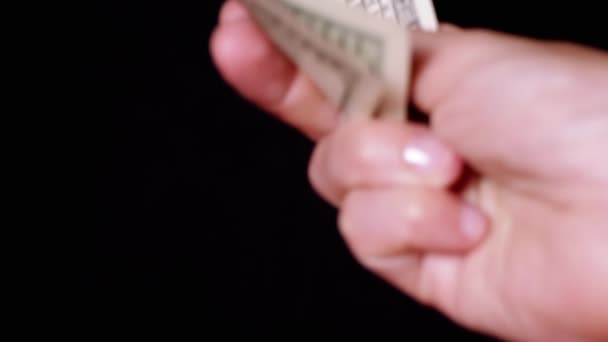 Hand Holding Three 100 Dollar Bills Isolated Black Background Concept — Stock Video