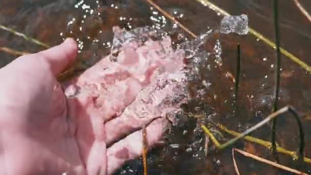 Female Hand Splashing Water Playing Creating Splashes Sun Sunset Fingers — Wideo stockowe