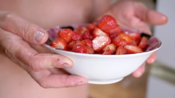 Hands Farmer Holding Full Glass Bowl Red Strawberry Sunlight Blurred — Video Stock