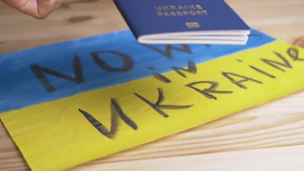 Hand Puts Biometric Passport Ukraine Background Ukrainian Flag Inglês Inscrição — Vídeo de Stock