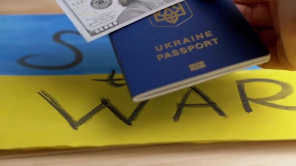 Hand Puts Biometric Passport Ukraine Cash Background Flag Desenho Amarelo — Vídeo de Stock