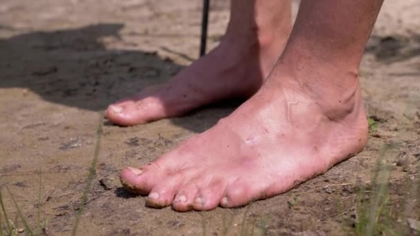 Male Tanned Legs Standing Wet Sand Water Rays Sunlight Nature — Αρχείο Βίντεο