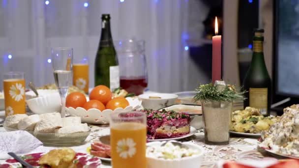 Burning Red Christmas Candle Burns Bright Flame New Years Table — Vídeo de stock