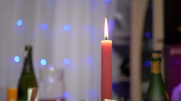 Burning Red Christmas Candle Burns Bright Flame New Years Table — ストック動画