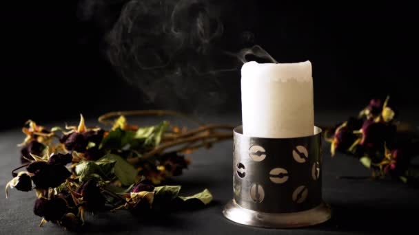 Extinguished Candle Flame Withered Dry Flowers Black Background Blowing Out — Stockvideo