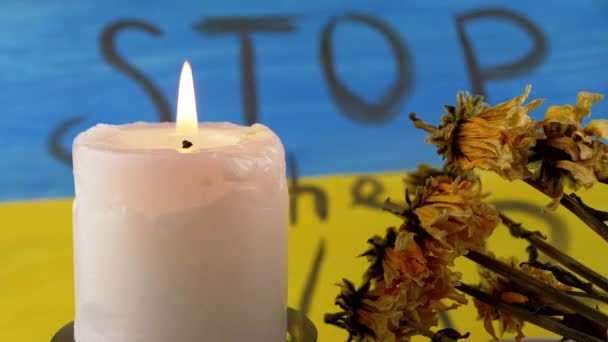 Burning Candle Withered Dry Flowers Background Flag Ukraine Inscription Stop — Stockvideo