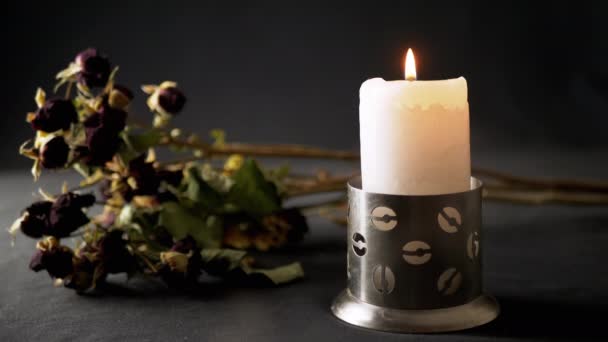 Burning Candle Flame Withered Dry Flowers Table Black Background Cloud — Video