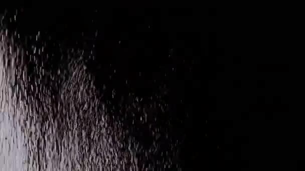 Akıntı Parçacıkları Kıvılcımlar Toz Enkaz Kara Arkaplanda Toz Şelale Kıvılcımları — Stok video