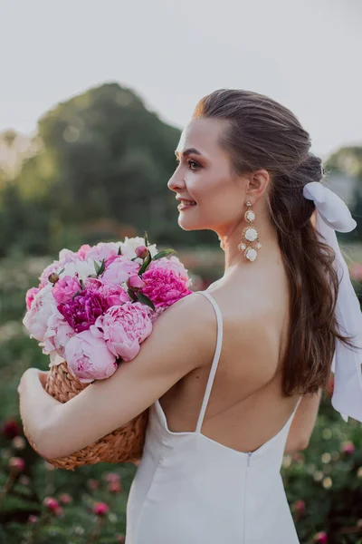 Young Woman Basket Pink Peonies — стоковое фото