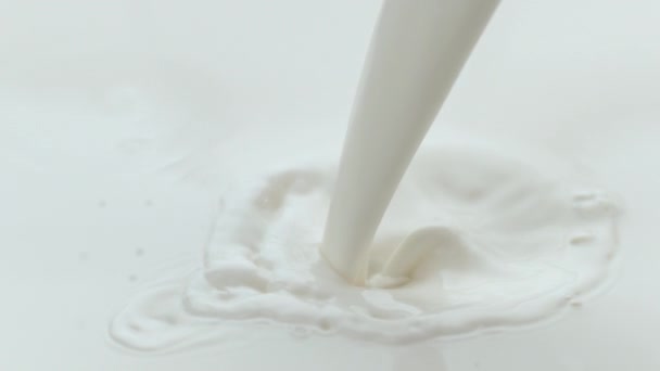 Milk Pouring Splashing Slow Motion — Stock Video