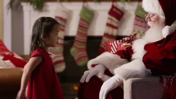 Little Girl Sits Santa Claus — Stock Video