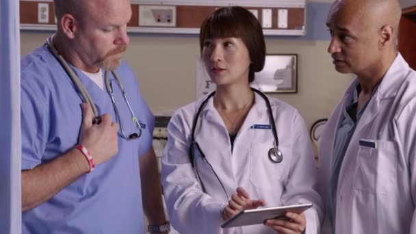 Medical Professionals Look Digital Tablet Together — Stock Video