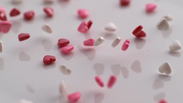 Valentine Day Heart Shaped Candy Falling Bouncing Slow Motion Shot — Stock Video