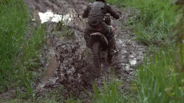 Man Rides Motorcycle Mud Slow Motion Shot Phantom Flex Stock Video
