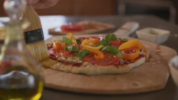 Chef Brushes Olive Oil Pizza Crust — Stock Video