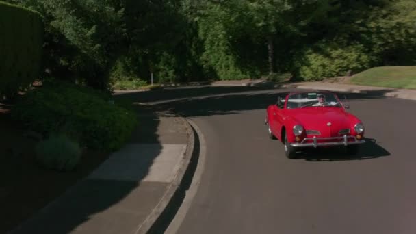 Tracking Shot Man Driving Classic Convertible Car Neighborhood Fully Released — Stock Video